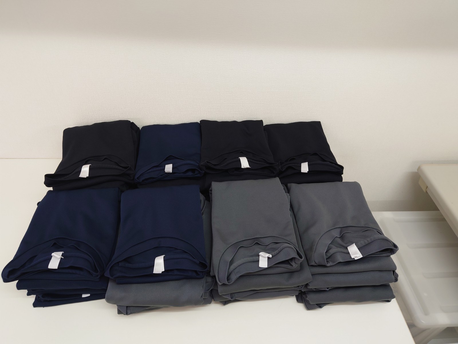 整体院の患者様用Tシャツ・施術用ズボンの洗濯代行｜お湯洗い＆たたみ指定対応、ドアtoドアでおまかせ♪