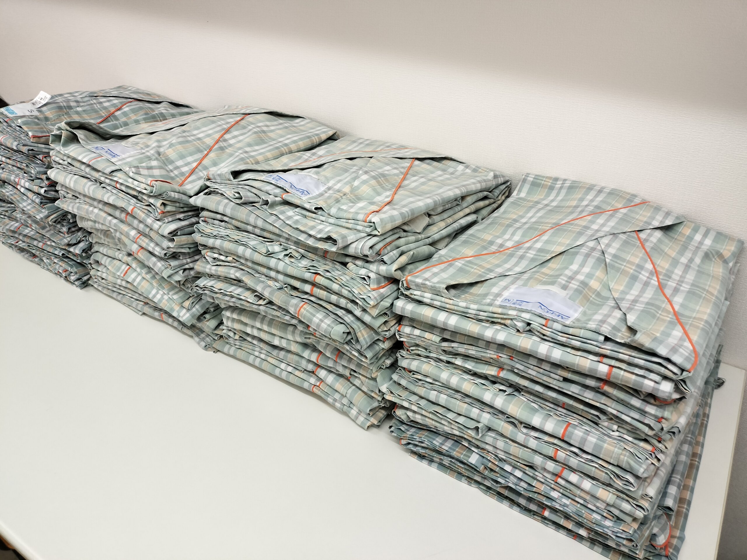 品川区の検査衣・患者衣洗濯代行｜1枚約66円で清潔に保てる定期配送サービス