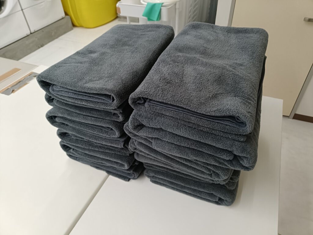 洗濯乾燥後バスタオルたたまれてる